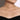 Woman wearing a delicate curved diamond bar necklace on a thin chain, elegant jewelry