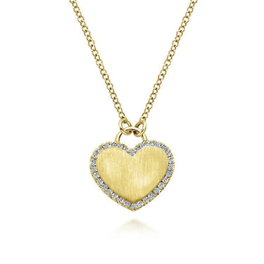 Yellow gold heart pendant necklace with diamond halo on a gold chain, bridal jewelry