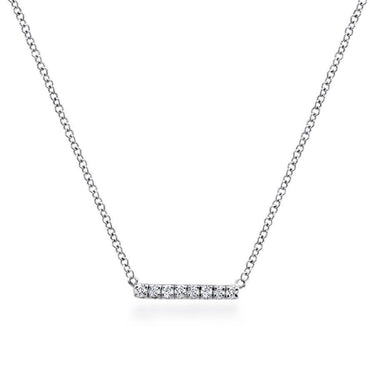 White gold bar necklace with round diamonds on delicate chain, minimalist jewelry