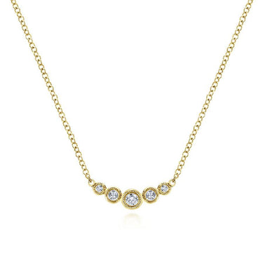 Gold necklace with five round bezel-set diamonds on cable chain, fine jewelry