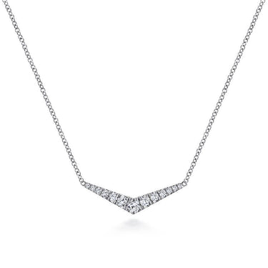 V-shaped diamond pendant necklace on a delicate white gold chain, minimalist jewelry