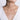 Diamond spike choker necklace with white gold chain on model wearing white top