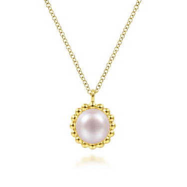 Gold chain necklace with round pink pearl pendant and beaded gold frame, elegant jewelry