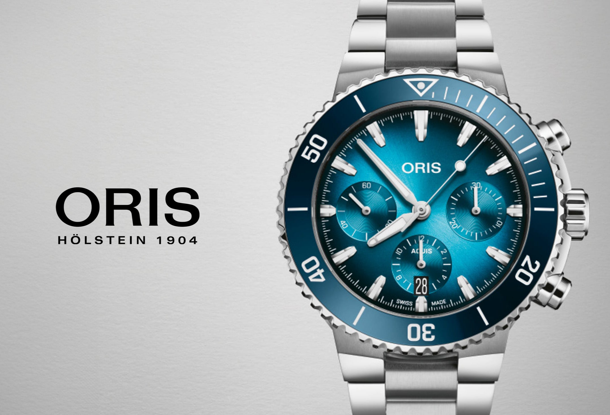 Oris luxury stainless steel dive watch with blue dial and chronograph features