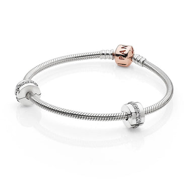 Silver snake chain bracelet with rose gold pandora clasp and two silver charms with clear crystals pandora iconic gift set