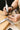 Jeweler crafting custom ring with precision tools, showcasing fine jewelry making and bridal design expertise.